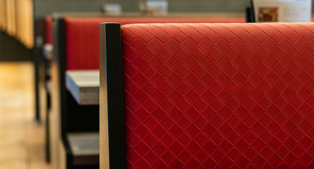 Skai<sup>®</sup> artificial leather in red and violet for the catering trade