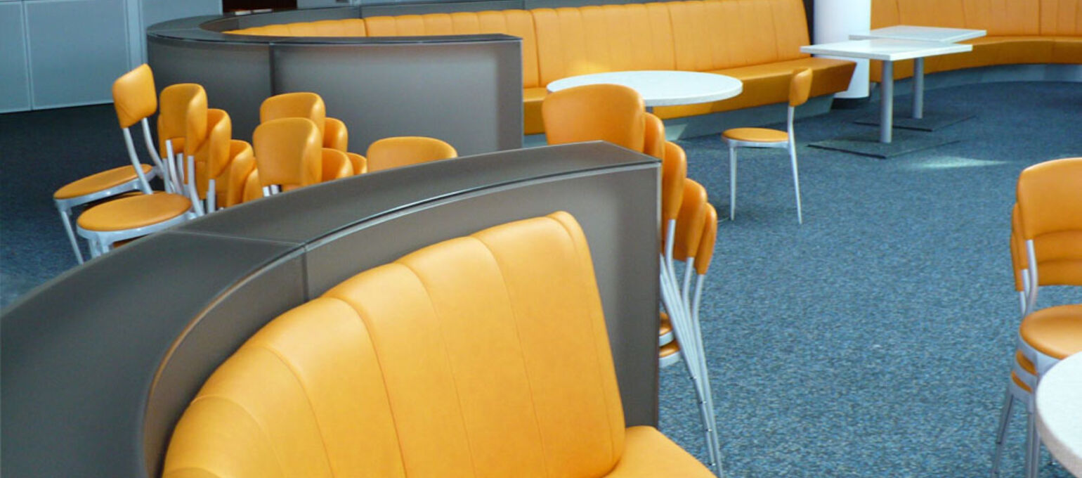 Artificial leather from skai® in yellow and orange for upholstered furniture
